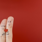 two-fingers-painted-with-faces_23-2147999775